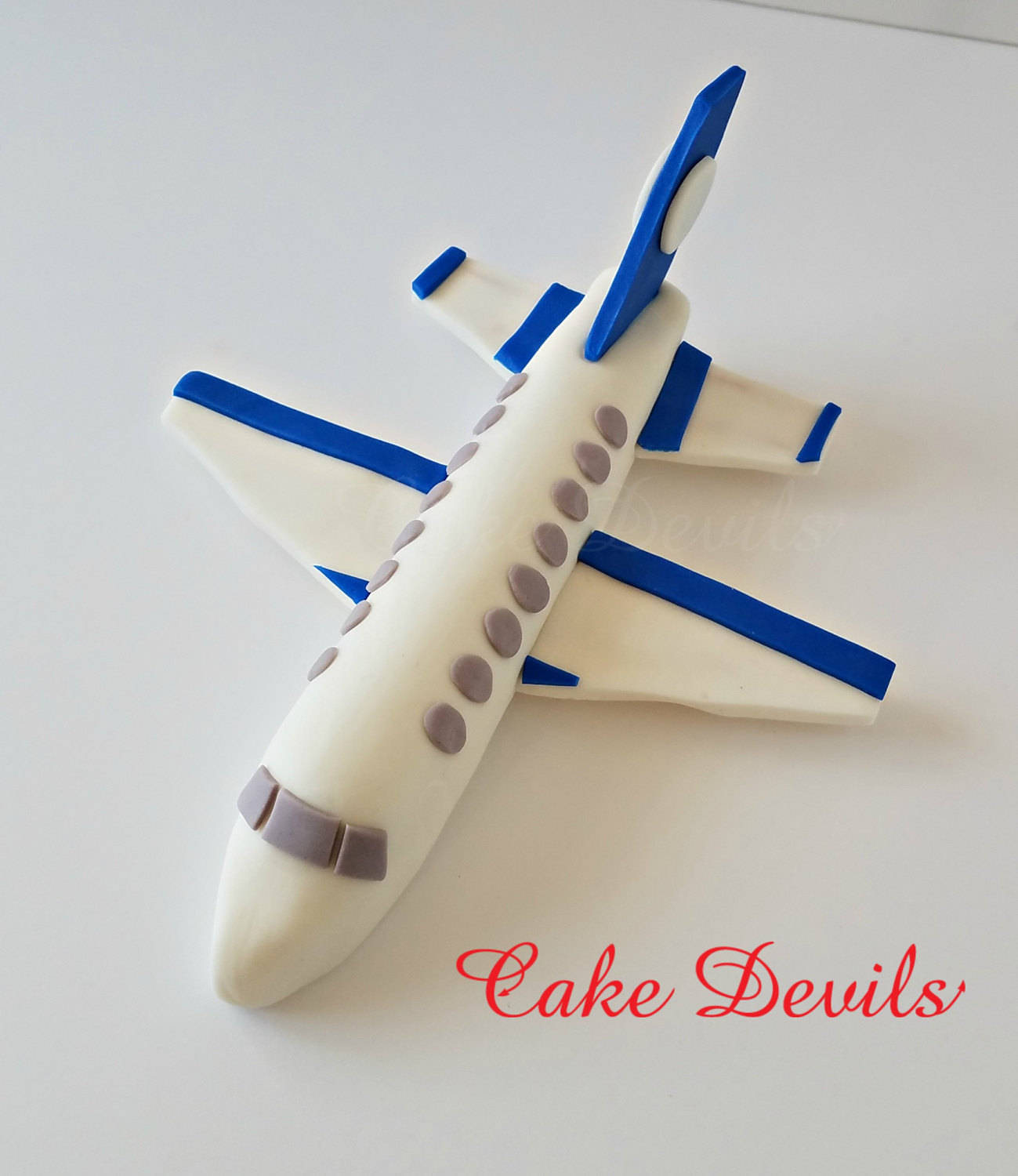 Orange airplane cake topper - CakesDecor